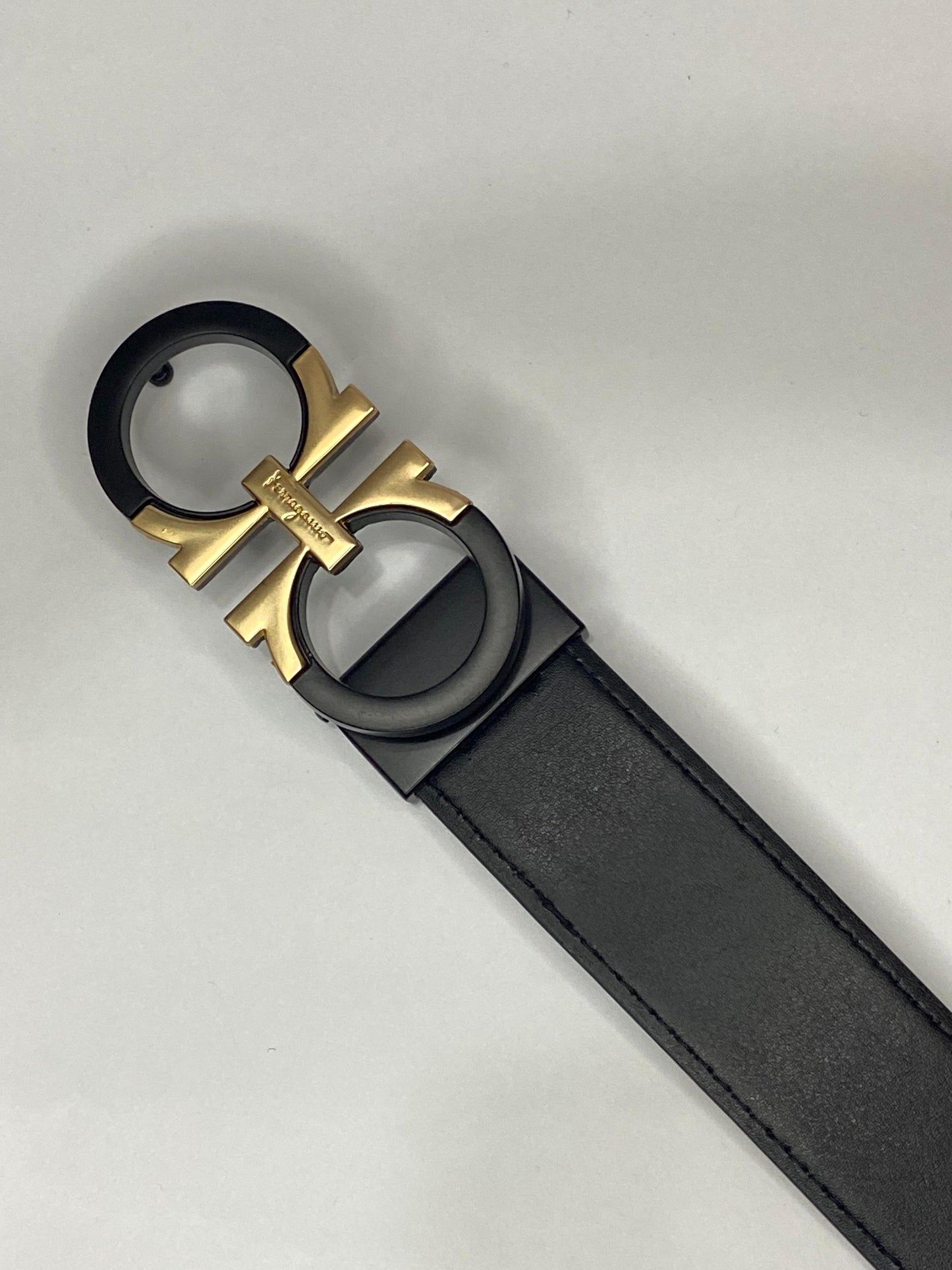 Salvatore Ferragamo Reversible and Adjustable Gancini Belt for Men Black/Gold waist-48